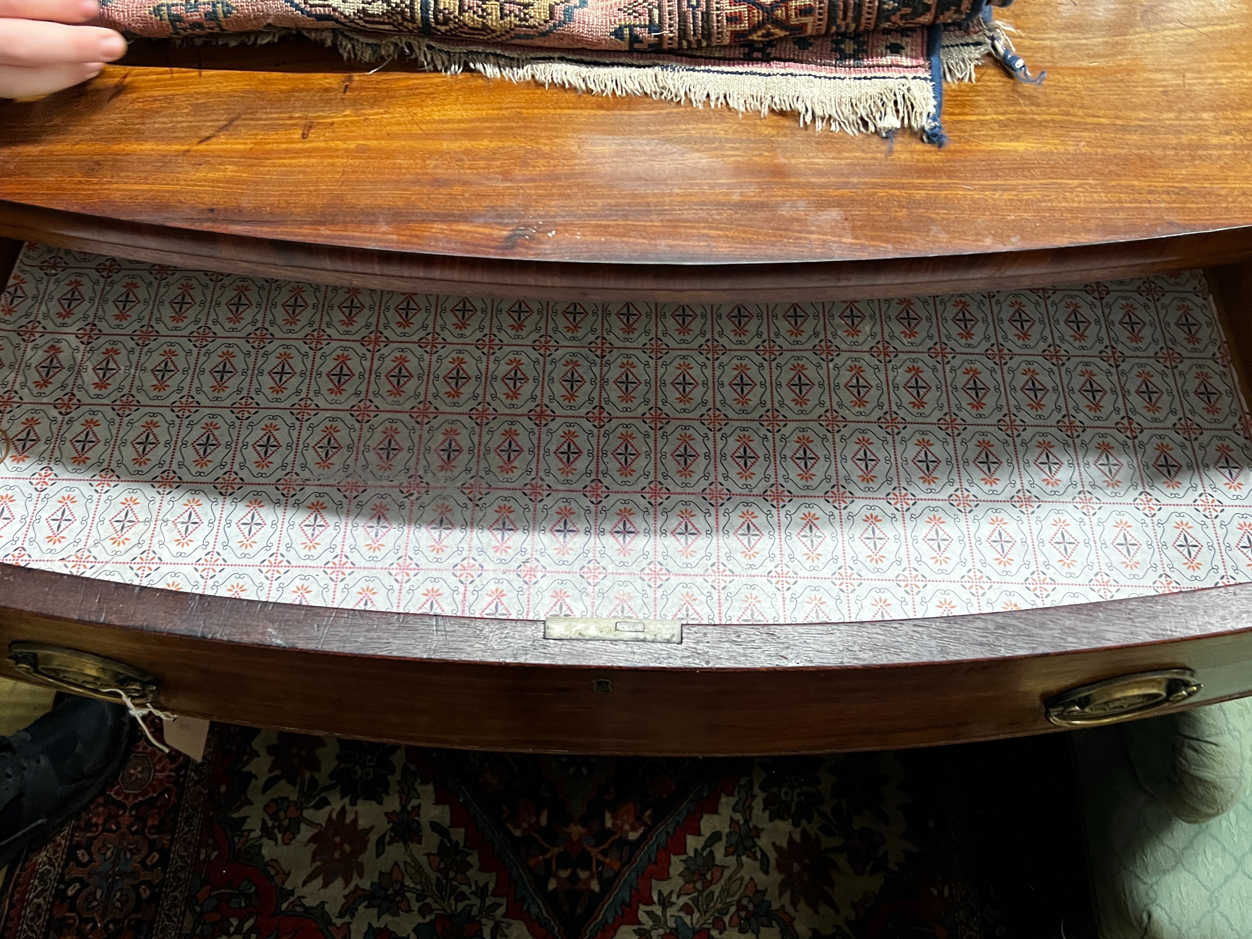 A Regency mahogany bow fronted chest of three long graduated drawers, width 100cm, depth 53cm, height 89cm